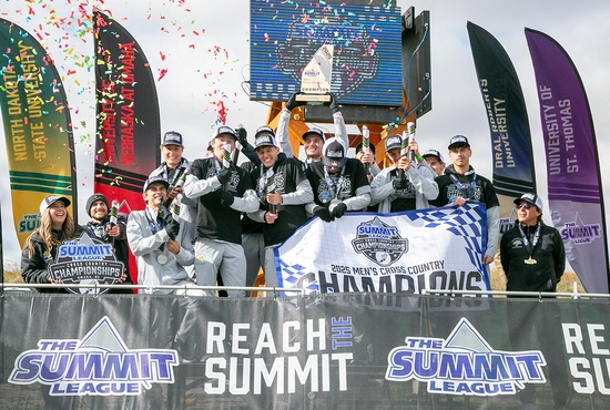 SDSU men's cross country team celebrates after winning the Summit League Championship.