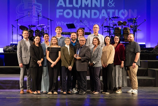 Members of the Scott and Lani Ramsdell family smile with their Philanthropic Family of the Year award.