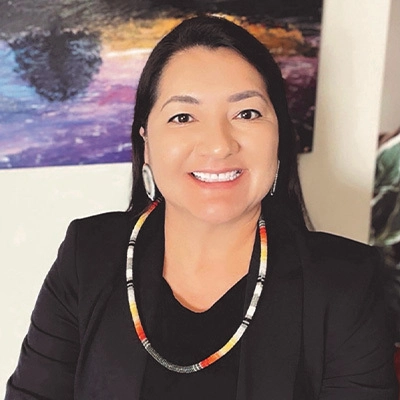 Dawn Tobacco Frank smiles at the camera