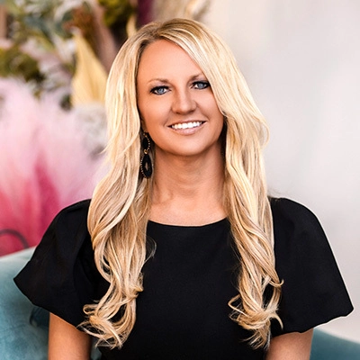 Jill Janecke smiles at the camera