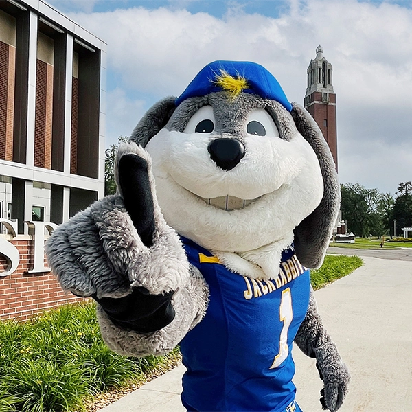 Jack the Jackrabbit smiles, holding up his pointer finger in the "1" gesture.