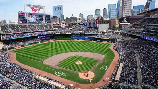 Panoramic view of the Minnesota Twins baseball stadium with fans in the stands.