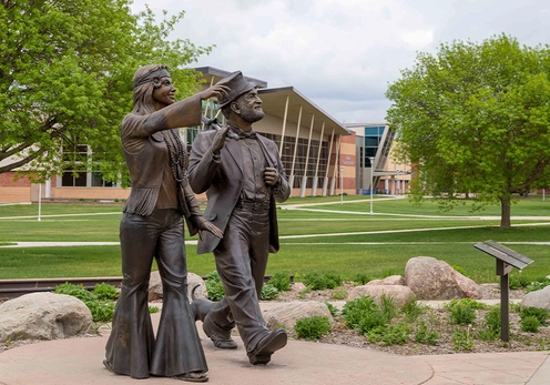 Bronze Dirty Lil and Weary Will Hobo Day statues on SDSU's campus.