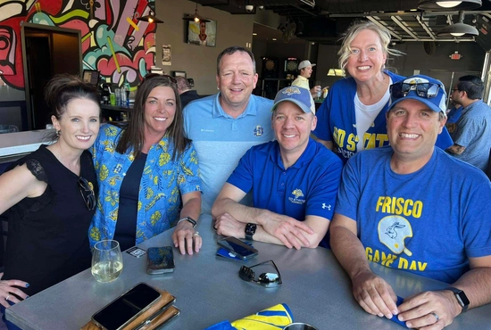 A group of people in jackrabbit gear at a restaurant