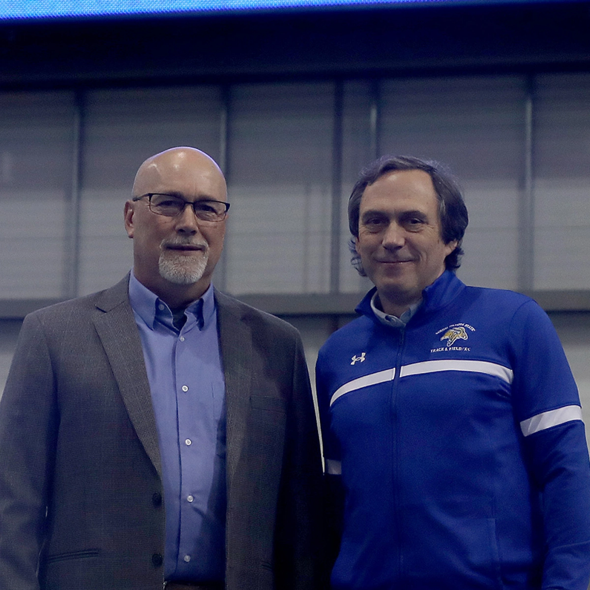 Two men standing together