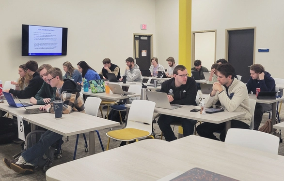 South Dakota State University students interacting during a course Erin Miller is teaching at the Metro Center.