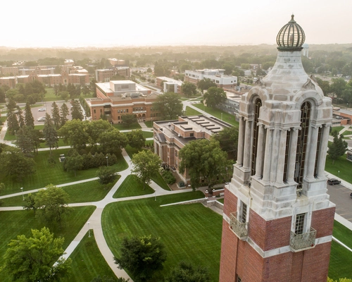 Coughlin Campanile aerial photo with the rest of campus in the background