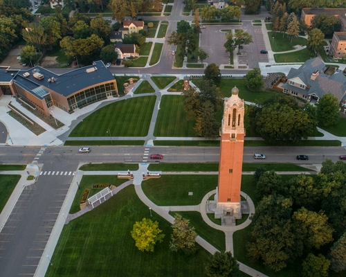Aerial photo of the Campanile in the center, along with the Lohr Building on the right and the President's Home on the right