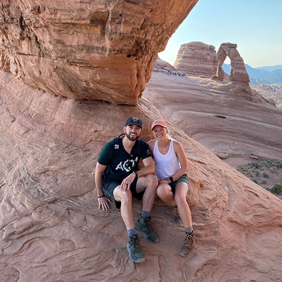 Allie and her husband on a hike
