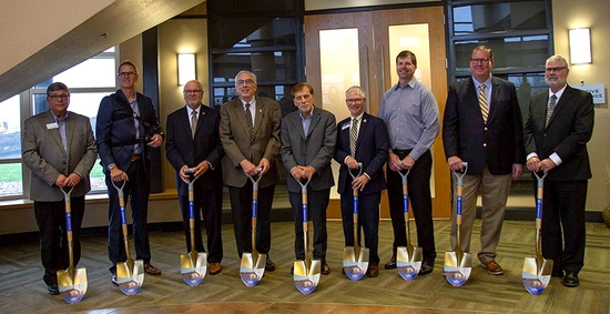 Group photo of people with shovels in their hands, taken at the groundbreaking of the POET Bioprocessing Institute. L to R: Dwaine Chapel, Jeff Lautt, Jim Rankin, Barry Dunn, David Salem, Daniel Scholl, Kevin Tetzlaff, Jeff Partridge, Ralph Davis