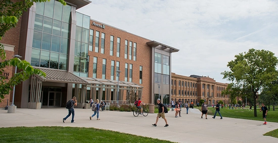 Avera Health and Science Center on the SDSU campus, shown with college students walking around outside of the building