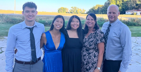 Hailey Gruber smiles with her family.