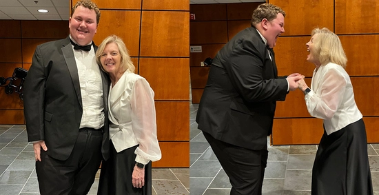 Steiger Manson and Dr. Laura Diddle smile and celebrate after a standing ovation performance by the concert choir and solosit Steiger during Yuletide.