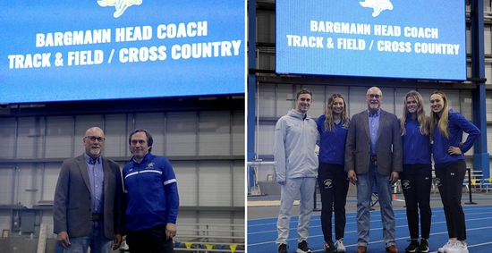 Brent Bargmann and Rod DeHaven stand together with a screen that reads "Bargmann Head Coach Track & Field/Cross Country."