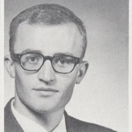 Historic black and white yearbook headshot photo of Vern Schramm