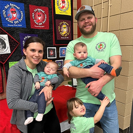 Jenny and her husband with their three children