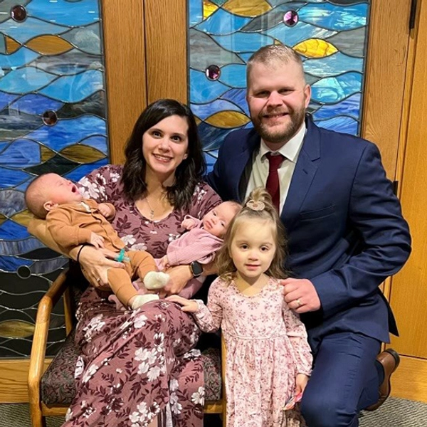 Jenny and her husband with their three children