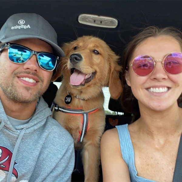 Jordan with her husband and their dog