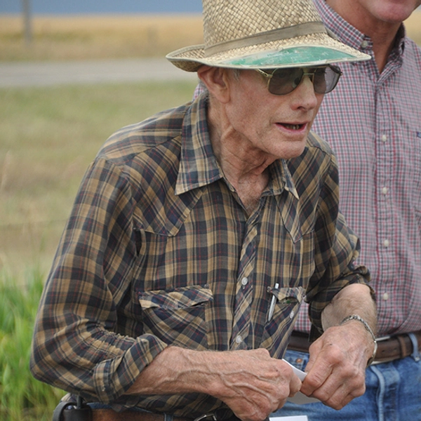 Recent colored photo of Klingbeil, standing in a field looking off into the distance.