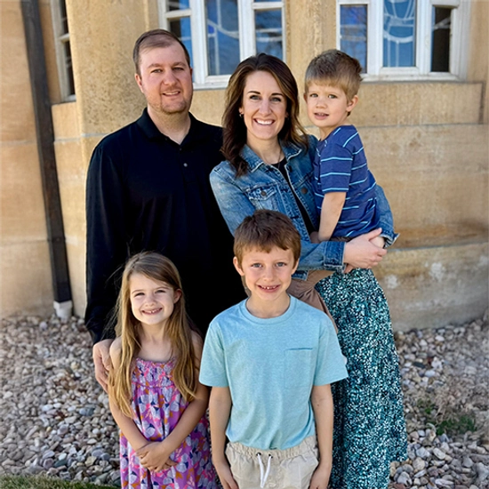 Jenn McCloud with her husband and three kids