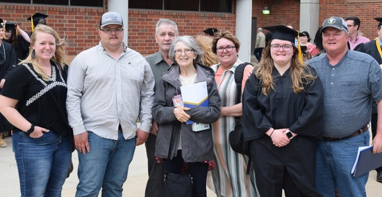 SDSU graduate with their family
