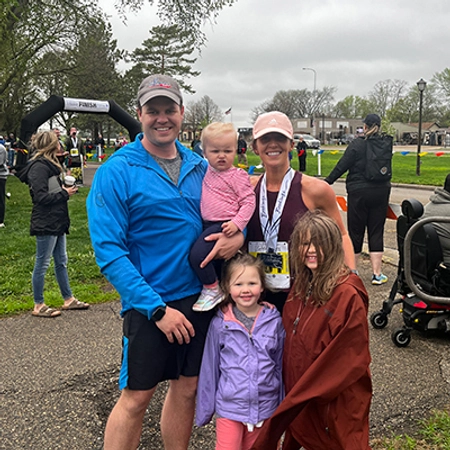 Mark Sandager and his family pose for a photo after his wife, Ellen, just completed a race.