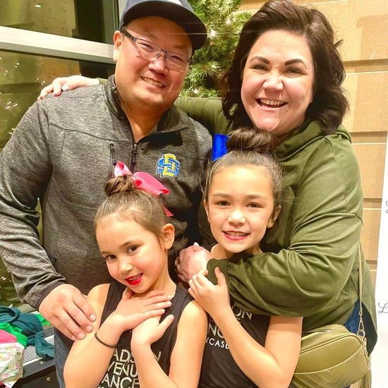 Micheal with his wife and two daughters