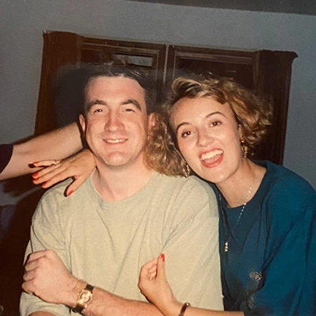 A young Marc and Julie Mooney smiling for the camera.