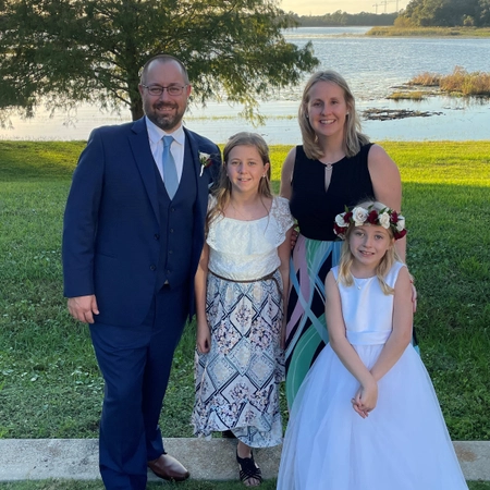 Ned with his wife and two daughters