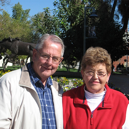 Lowell and Deanna Satterlee smiling outside together