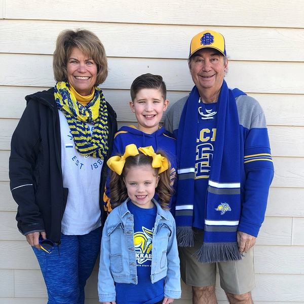 Tom with his wife and family in jackrabbit gear