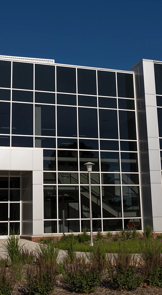 Outdoor scene of the Raven Precision Agriculture Center on a sunny day.