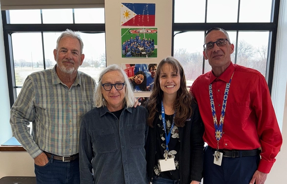 Tate Profilet and Mary DeJong smile with Carie Green and Brian Brown.