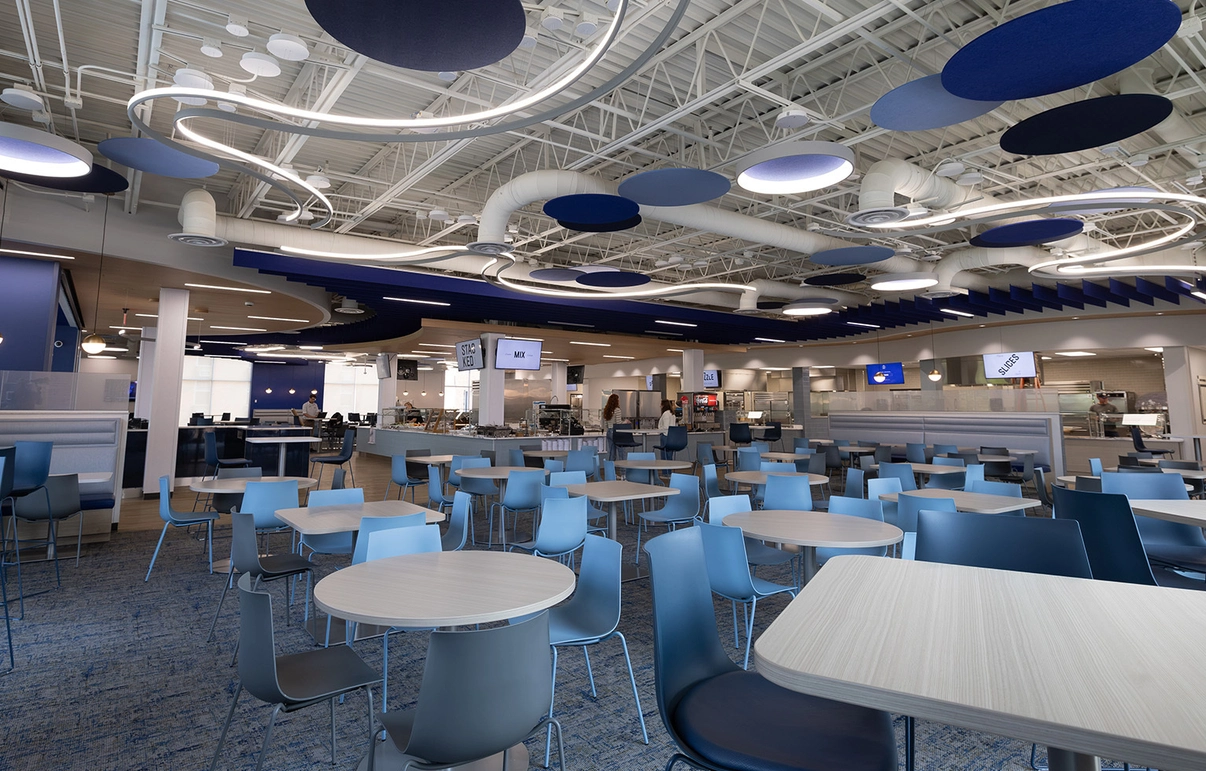 A photo of empty seating in the newly renovated Larson Commons.