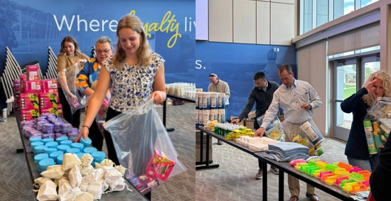A group of people packing up hygiene items into plastic bags.