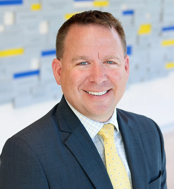 professional headshot of andrew wenthe