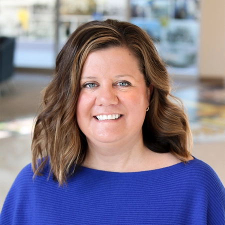 Professional headshot of Lindsey Davis.