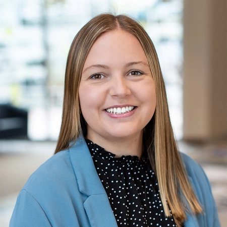 Professional headshot of Madi Jones