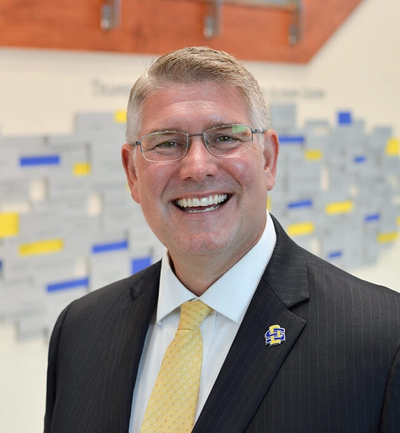 professional headshot of mike birgen