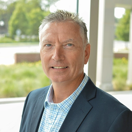 professional headshot of tim dwire