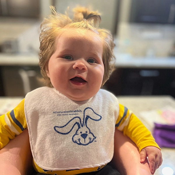 photo of Future Jackrabbit Adalyn wearing a Future Jackrabbit bib