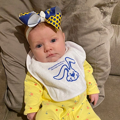 Future Jackrabbit Audie wearing a Future Jackrabbit bib.