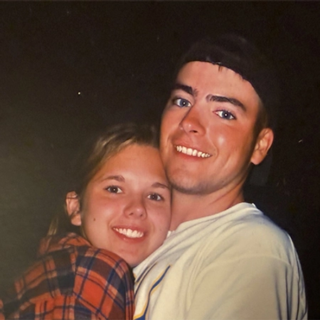 Jeff and Lori Skinner embrace each other and smile during their college days.