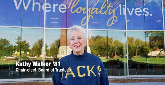 Woman smiling standing outside the Foundation building
